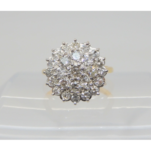 2710 - A SUBSTANTIAL DIAMOND CLUSTER RINGset with estimated approx 1ct of brilliant cut diamonds, finger si... 