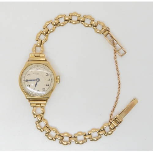 705 - A 9ct gold ladies vintage watch and strap, weight including mechanism 17.5gms 