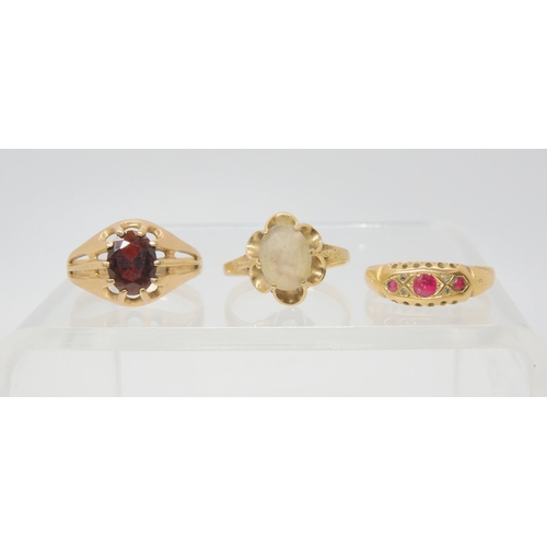 741 - An 18ct gold red gem and diamond accent ring, size P1/2, weight 1.6gms, a 9ct gold garnet ring size ... 