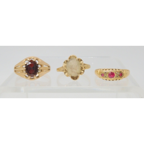 741 - An 18ct gold red gem and diamond accent ring, size P1/2, weight 1.6gms, a 9ct gold garnet ring size ... 