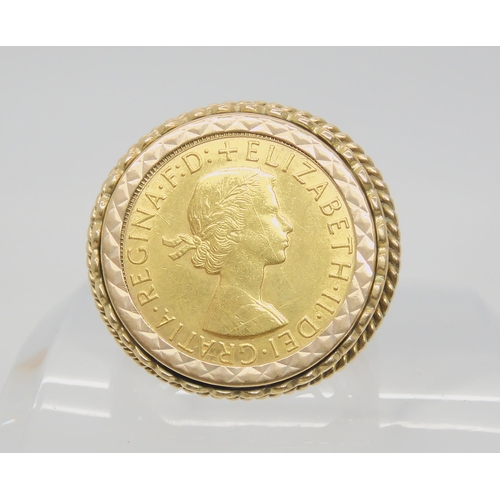 743 - A 1964 full gold sovereign, in a 9ct gold ring mount. Gents finger size 2 1/2, weight 17.1gms