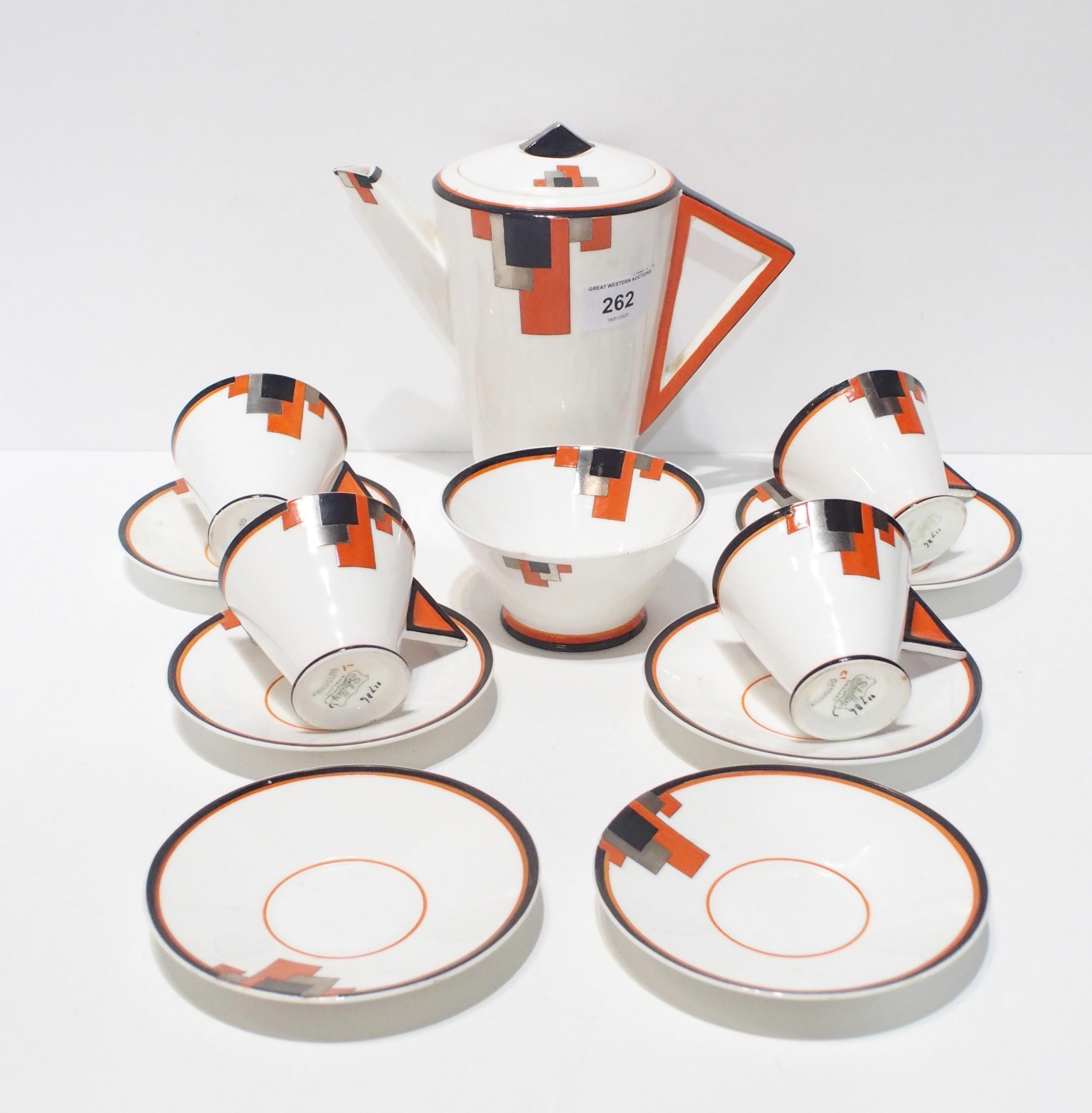 A Shelley Art Deco vogue shaped part coffee set comprising coffee