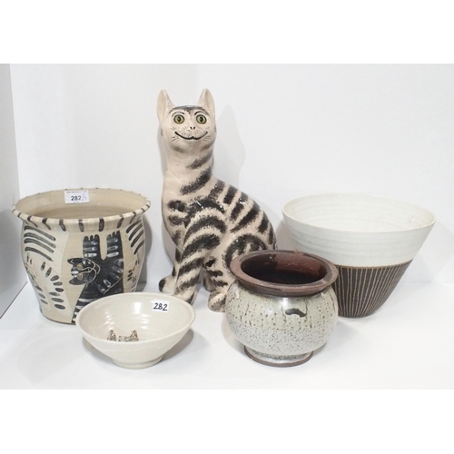 282 - A Griselda Hill pottery tabby cat, an Irma Demianczuk studio pottery jardinière and bowl both with c... 