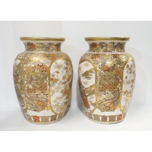 283 - A large pair of Satsuma vases, each with decoration of warriors
