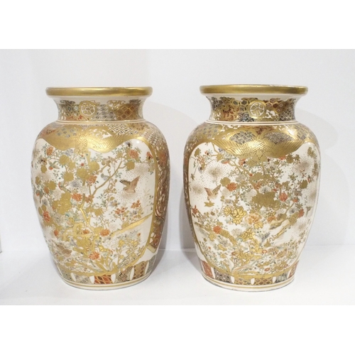 283 - A large pair of Satsuma vases, each with decoration of warriors