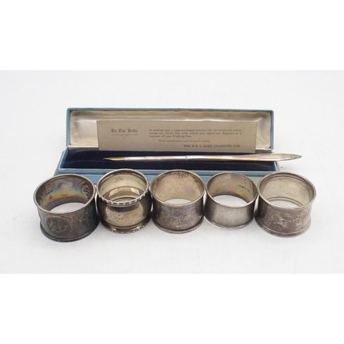 426 - A collection of silver including a silver dip pen, the tip inscribed 'A Souvenir from Burlington Hou... 