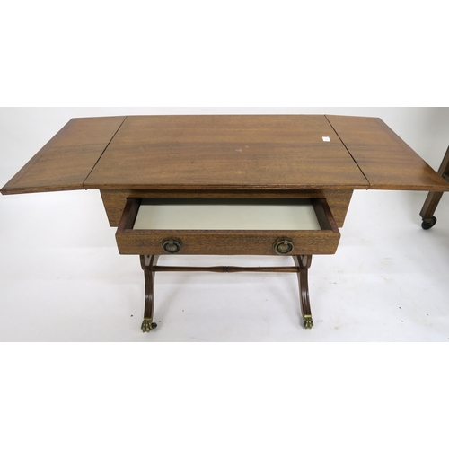 103 - A 20th century mahogany drop side single drawer lamp table and a single drawer drop side tea trolley... 