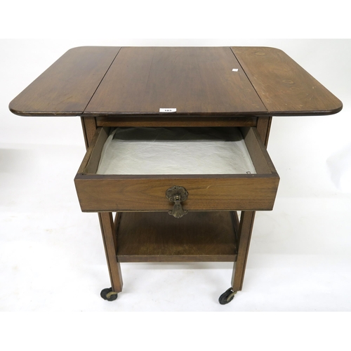 103 - A 20th century mahogany drop side single drawer lamp table and a single drawer drop side tea trolley... 