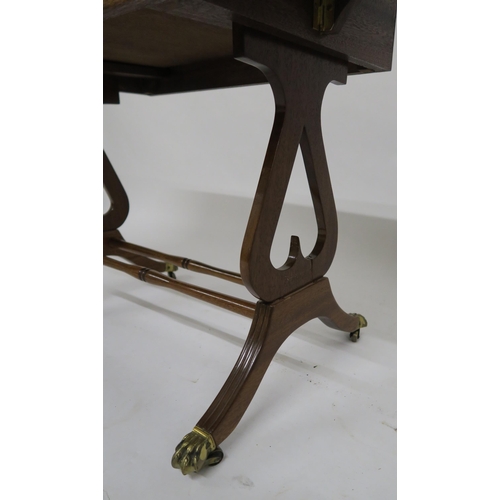 103 - A 20th century mahogany drop side single drawer lamp table and a single drawer drop side tea trolley... 