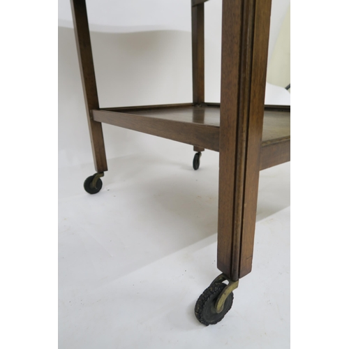 103 - A 20th century mahogany drop side single drawer lamp table and a single drawer drop side tea trolley... 