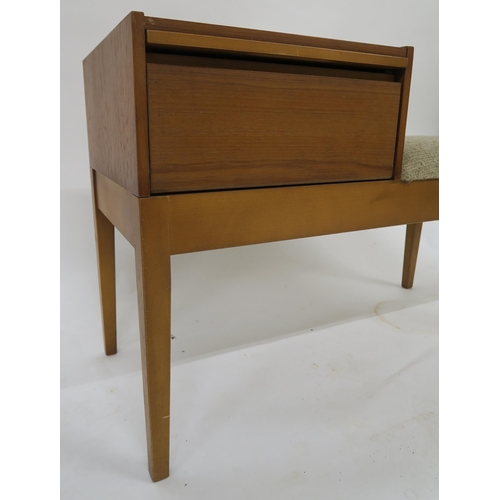 108 - A mid 20th century teak Chippy telephone seat with pull out aide memoir slide over fall front compar... 