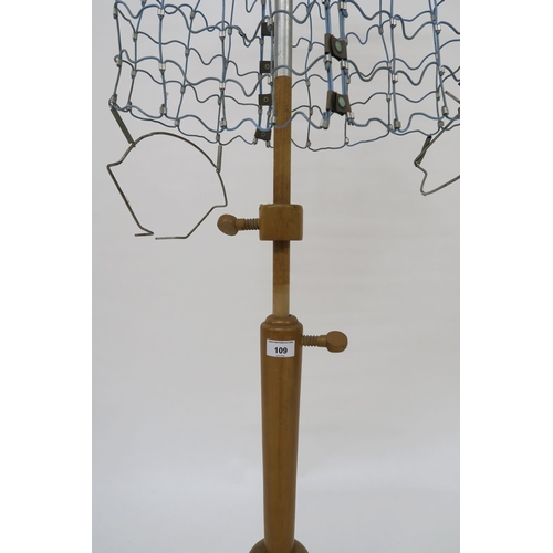 109 - A mid 20th century wire form dress makers mannequin on adjustable pine tripod base, 157cm high