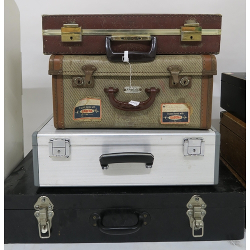 111 - A mixed lot of eight assorted travel and tool cases and a small painted bookcase (9)