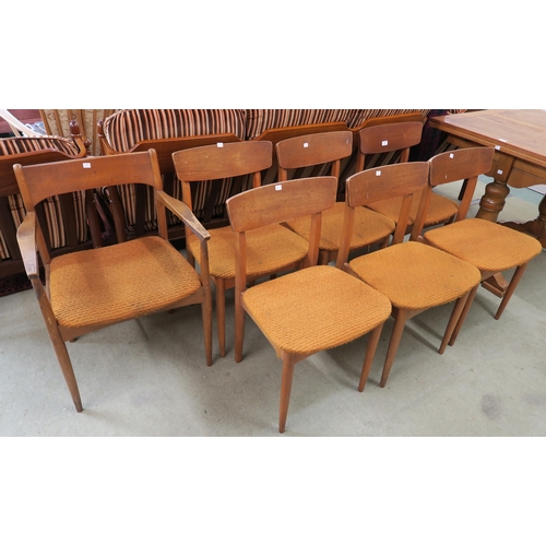 75 - A lot of seven mid 20th teak framed dining chairs (7)