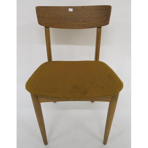 75 - A lot of seven mid 20th teak framed dining chairs (7)