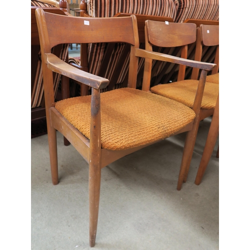 75 - A lot of seven mid 20th teak framed dining chairs (7)