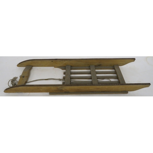 99 - A 20th century Murray & Baldwin Ltd sled, 131cm long x 36cm wide