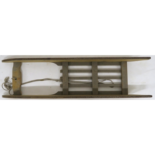 99 - A 20th century Murray & Baldwin Ltd sled, 131cm long x 36cm wide