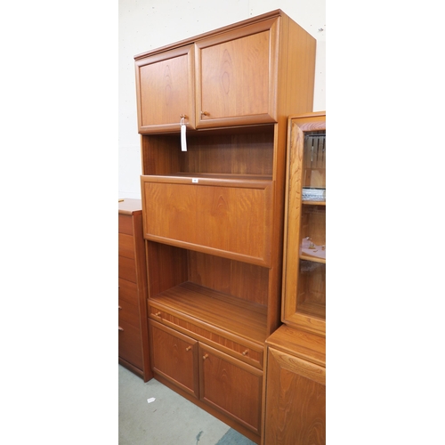 84 - A 20th century teak McIntosh secretaire bookcase with pair of cabinet doors over fall front writing ... 