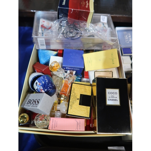 230 - A quantity of perfume bottles including Givenchy, Chanel No 5, Moschina, Fendi, Jean Paul Gaultier e... 