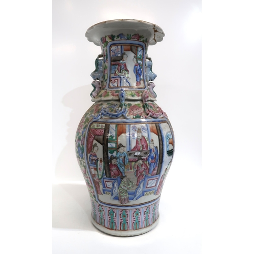 275A - A Chinese famille rose canton vase, of baluster form with a pie crust rim, decorated with panels of ... 