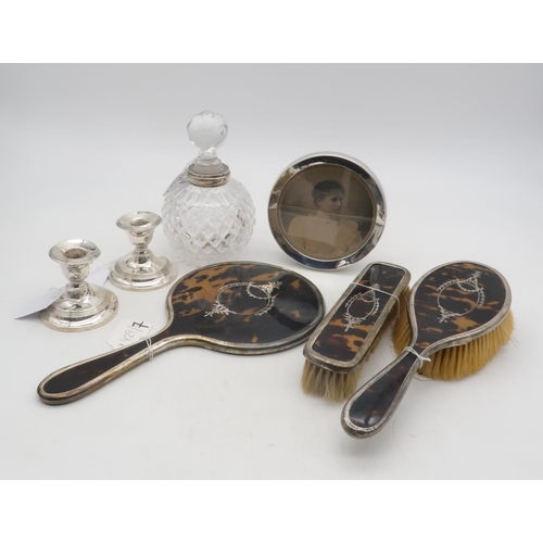 silver and tortoiseshell dressing table set A three piece silver tortoiseshell dressing table set, by W.G.S & Co,  Birmingham 1919, a silver