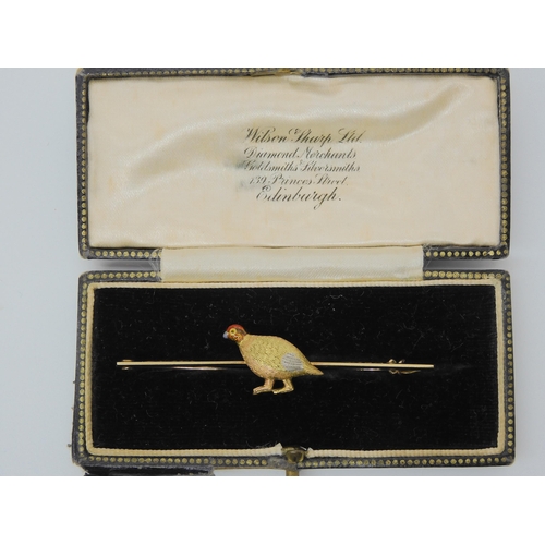 625 - A 15ct bi colour gold and platinum Grouse bird brooch with enamelled detail, length 6.2cm, weight 4.... 