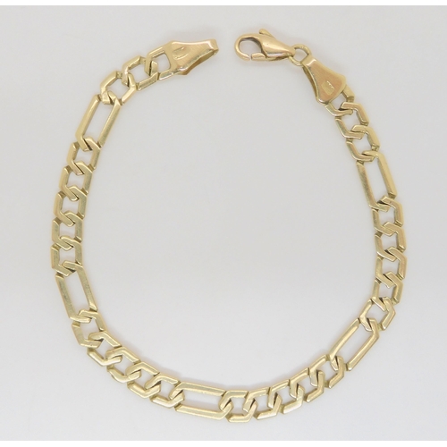 631 - A 14k gold fancy link bracelet, length 19.8cm, weight 9.7gms