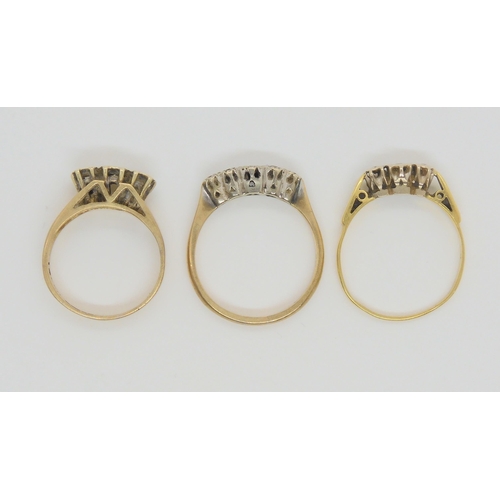 717 - Three illusion set rings, An 18ct three stone ring, weight 1.7gms size P, a retro 9ct three stone, s... 