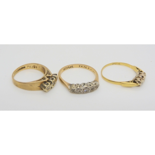 717 - Three illusion set rings, An 18ct three stone ring, weight 1.7gms size P, a retro 9ct three stone, s... 