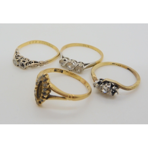 725 - Four 18ct rings and one in yellow metal, four are diamond set, together with a clear gem three stone... 