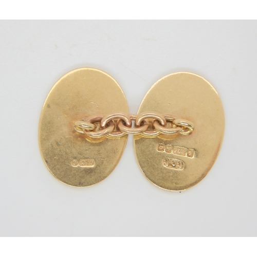 734 - A pair of 9ct gold cufflinks with both plain and engine turned faces, weight 8.4gms