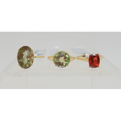 745 - Three Andesine rings, an unusual type of labradorite feldspar. A 9ct gold cushion cut red andesine a... 