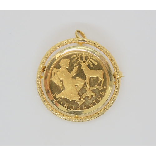 747 - A St. Hubertus fine gold coin (stamped 900 to the edge) weight on its own 14gms, diameter 2.5cms, in... 