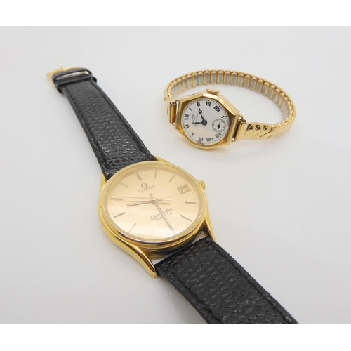 751 - A gold plated Omega Seamaster quartz, together with a 9ct gold ladies vintage Tissot watch with gold... 