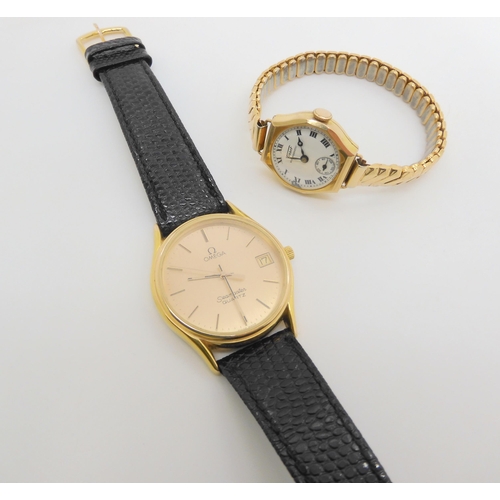 751 - A gold plated Omega Seamaster quartz, together with a 9ct gold ladies vintage Tissot watch with gold... 