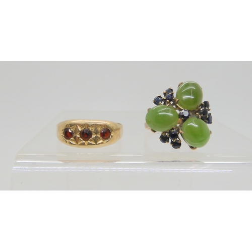 754 - A 9ct gold star set garnet ring, size Z1/2, together with a New Zealand jade and sapphire cluster ri... 