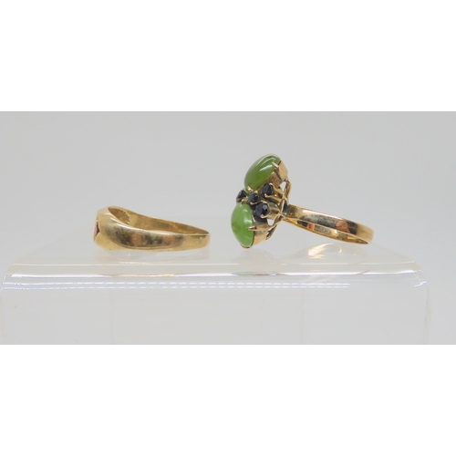 754 - A 9ct gold star set garnet ring, size Z1/2, together with a New Zealand jade and sapphire cluster ri... 