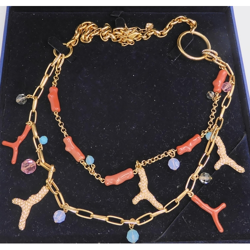 757 - A Swarovski coral themed necklace and bracelet set, with enamelled and gem set coral elements