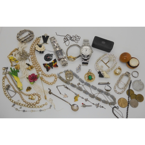 760 - A collection of costume jewellery to include a Black & white Whisky dog brooch, Watches and othe... 