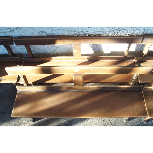 109 - A pair of early 20th century beech bench/pews with plain back on chamfered square supports, 79cm hig... 