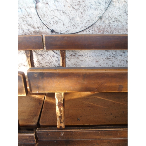 111 - A pair of early 20th century beech bench/pews with plain back on chamfered square supports, 79cm hig... 