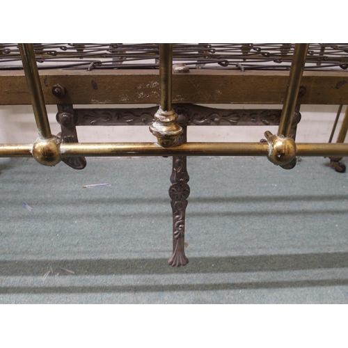 122 - A Victorian brass framed children's crib with drop sides, 117cm high x 68cm wide x 133cm long