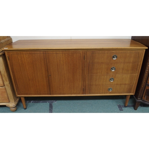 130 - A mid 20th century dining suite comprising stained teak extending dining table, 77cm high x 135cm lo... 