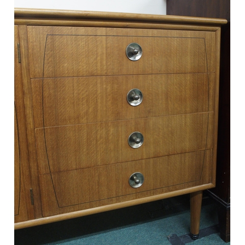 130 - A mid 20th century dining suite comprising stained teak extending dining table, 77cm high x 135cm lo... 