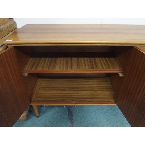 130 - A mid 20th century dining suite comprising stained teak extending dining table, 77cm high x 135cm lo... 