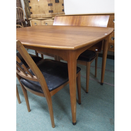 130 - A mid 20th century dining suite comprising stained teak extending dining table, 77cm high x 135cm lo... 