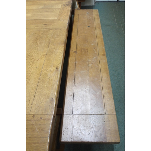 144 - A 20th century oak extending refectory style dining table, 75cm high x 190cm long (230cm extended) x... 