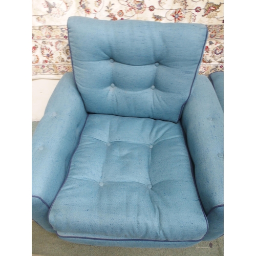 145 - A pair of mid 20th century blue upholstered armchairs, 69cm high x 80cm wide x 73cm deep and an acco... 