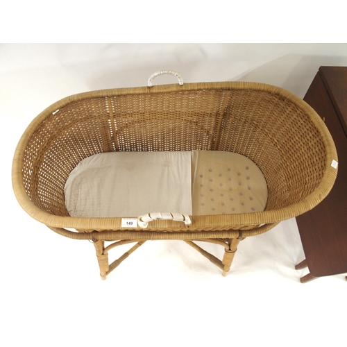 149 - A 20th century wicker Moses basket/crib